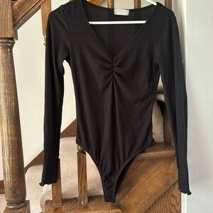 Black long sleeve body suit